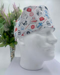 Star Wars white patterned scrub cap on a mannequin head with a white background with flowers