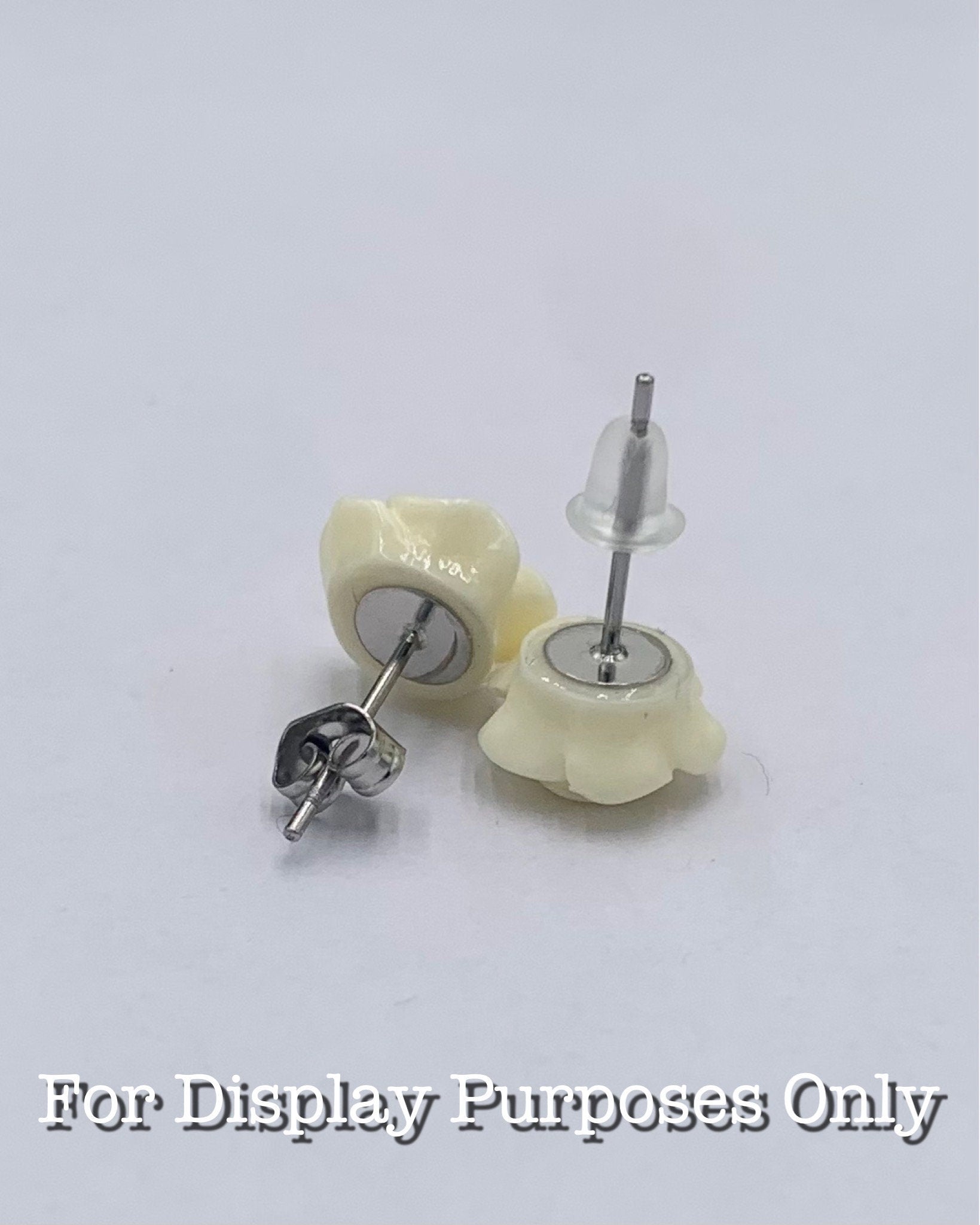 Two butter cream rose earrings on a white background with text 'For Display Purposes Only'.