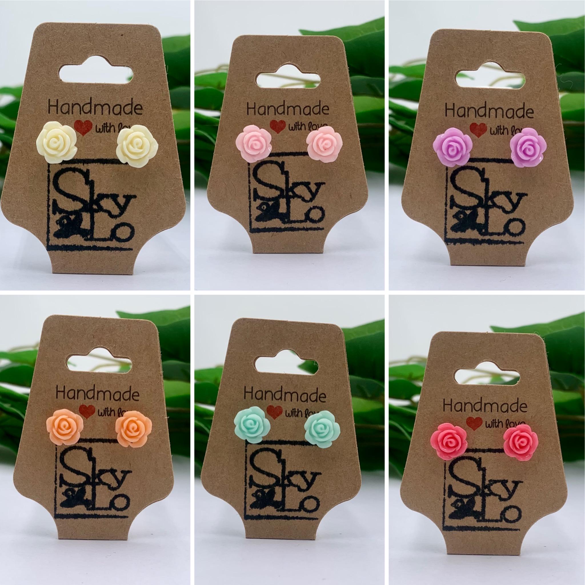 Set of six pairs of handmade rose earrings with 'SkyLo' branding on brown cards.