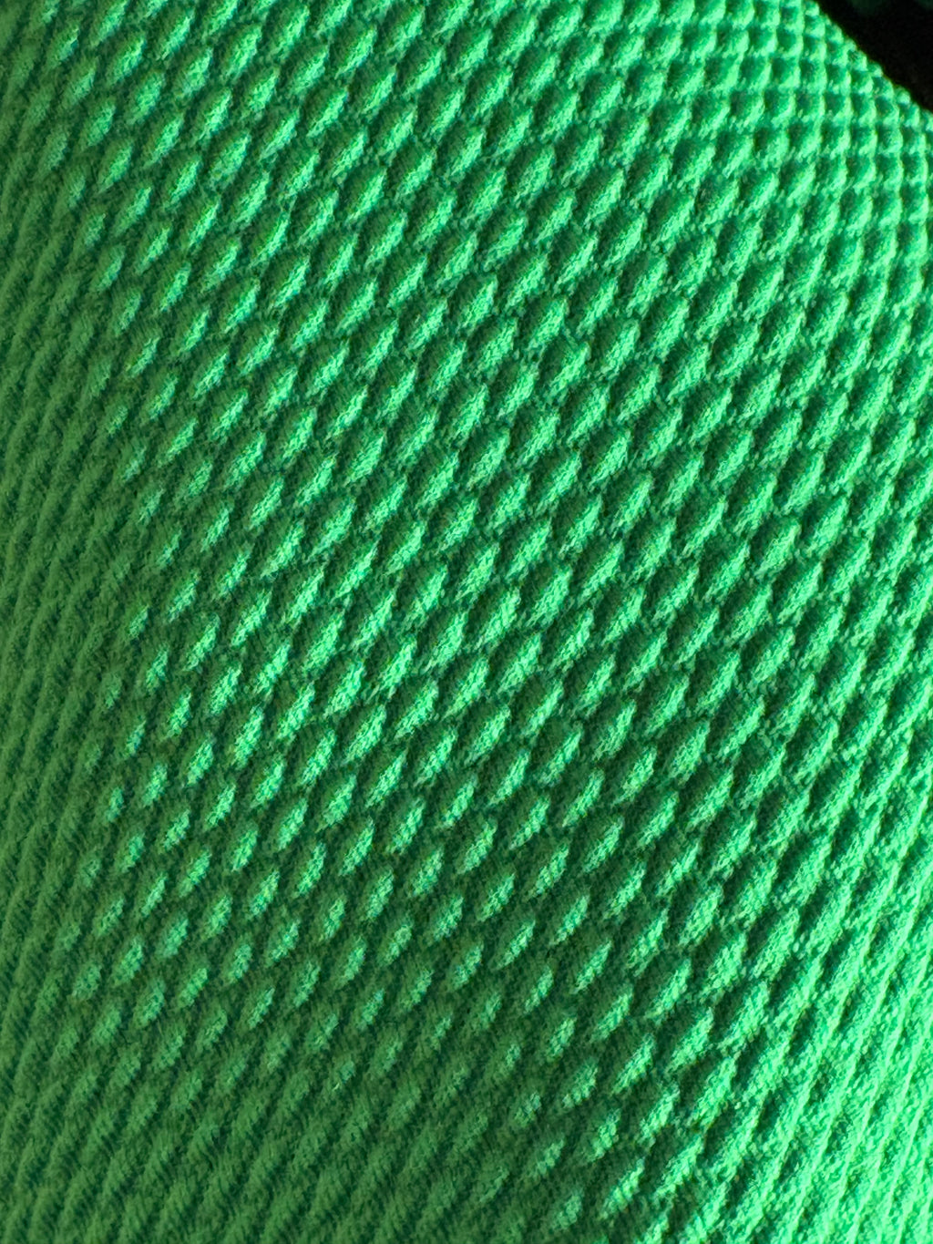 Close-up of lime green textured fabric