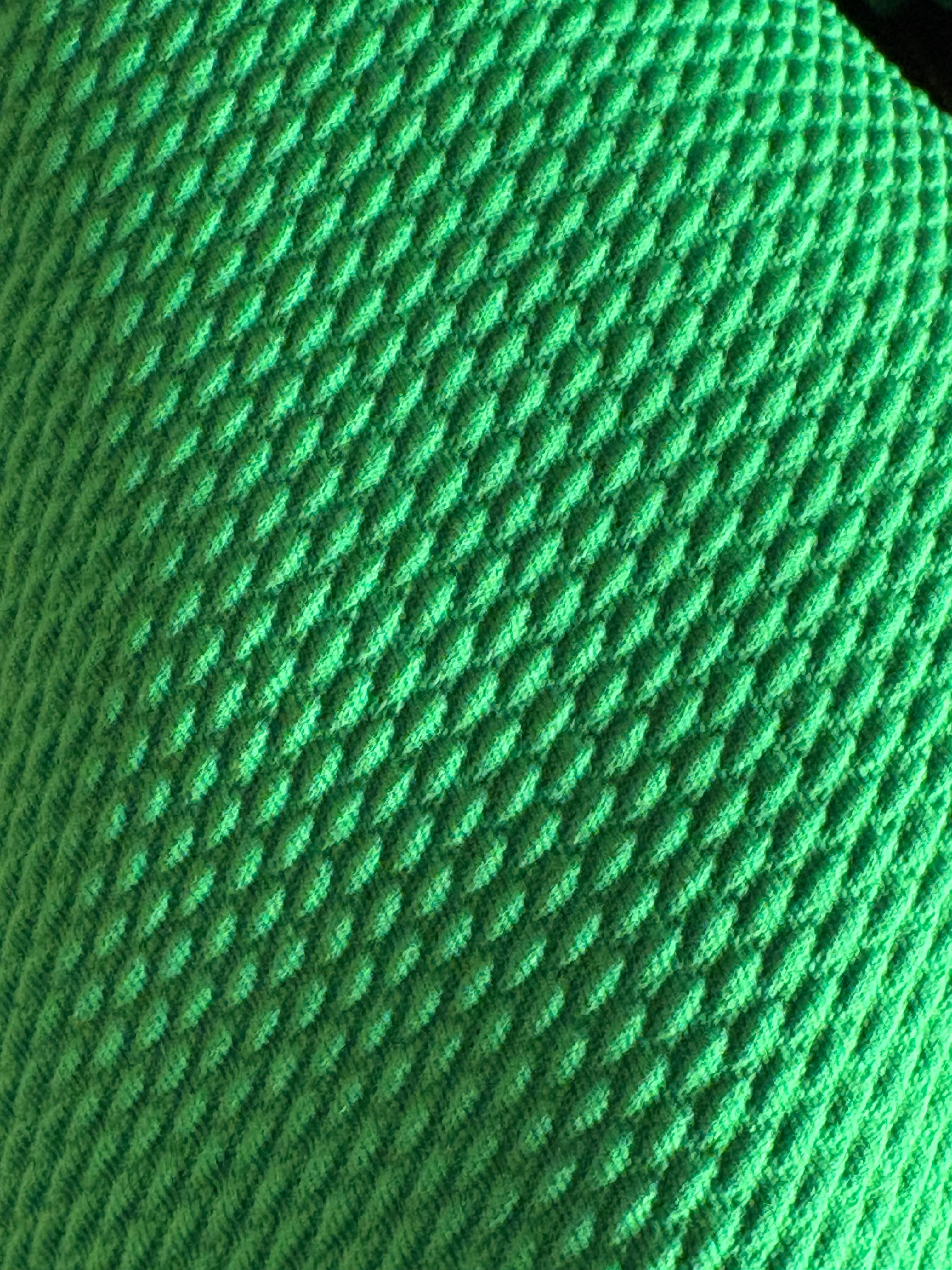 Close-up of lime green textured fabric
