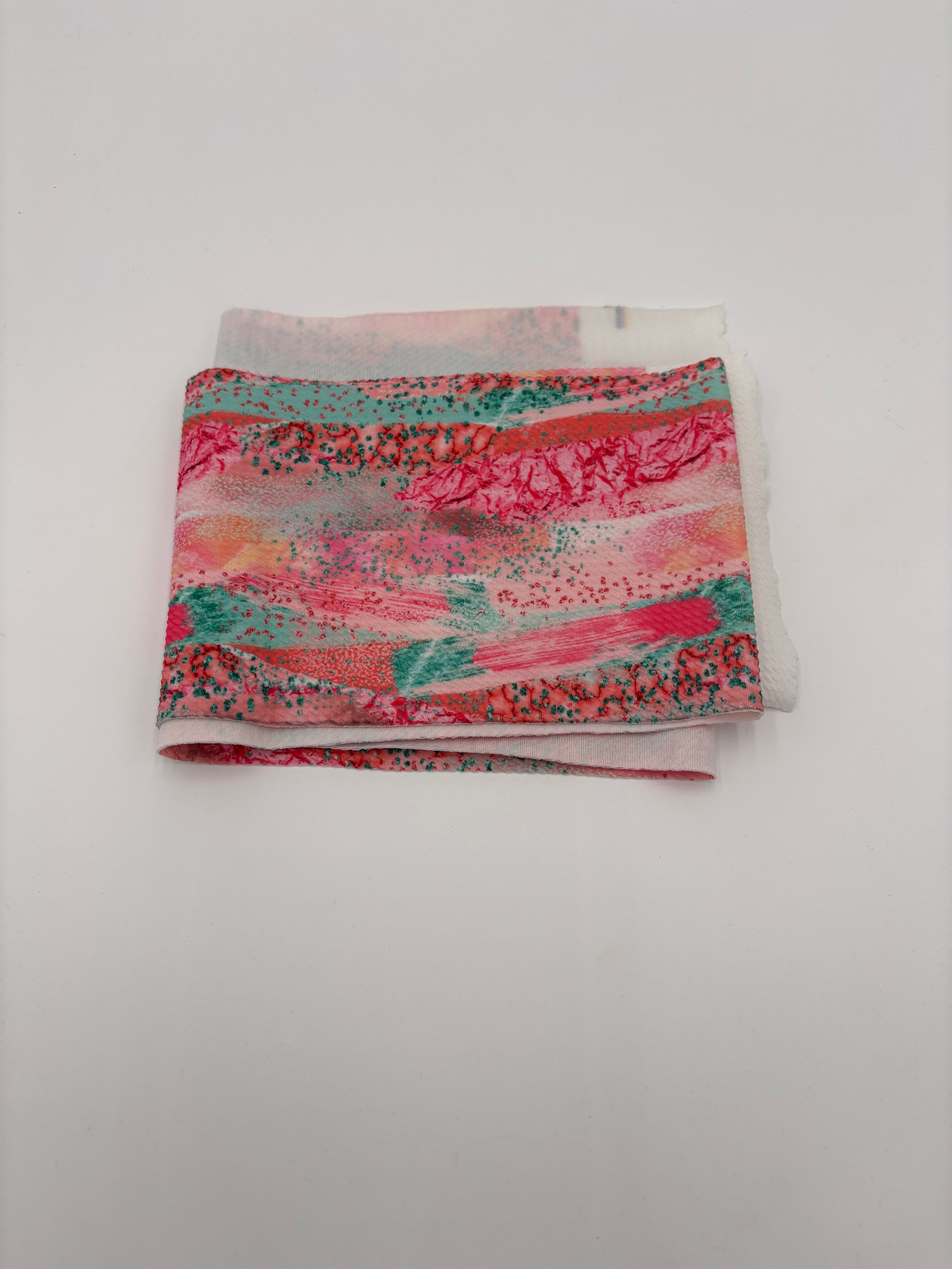 Colorful patterned fabric on a white background