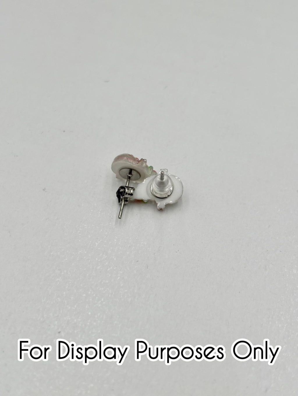 two reindeer shaped earrings with on a white background with text "for display purposes only"