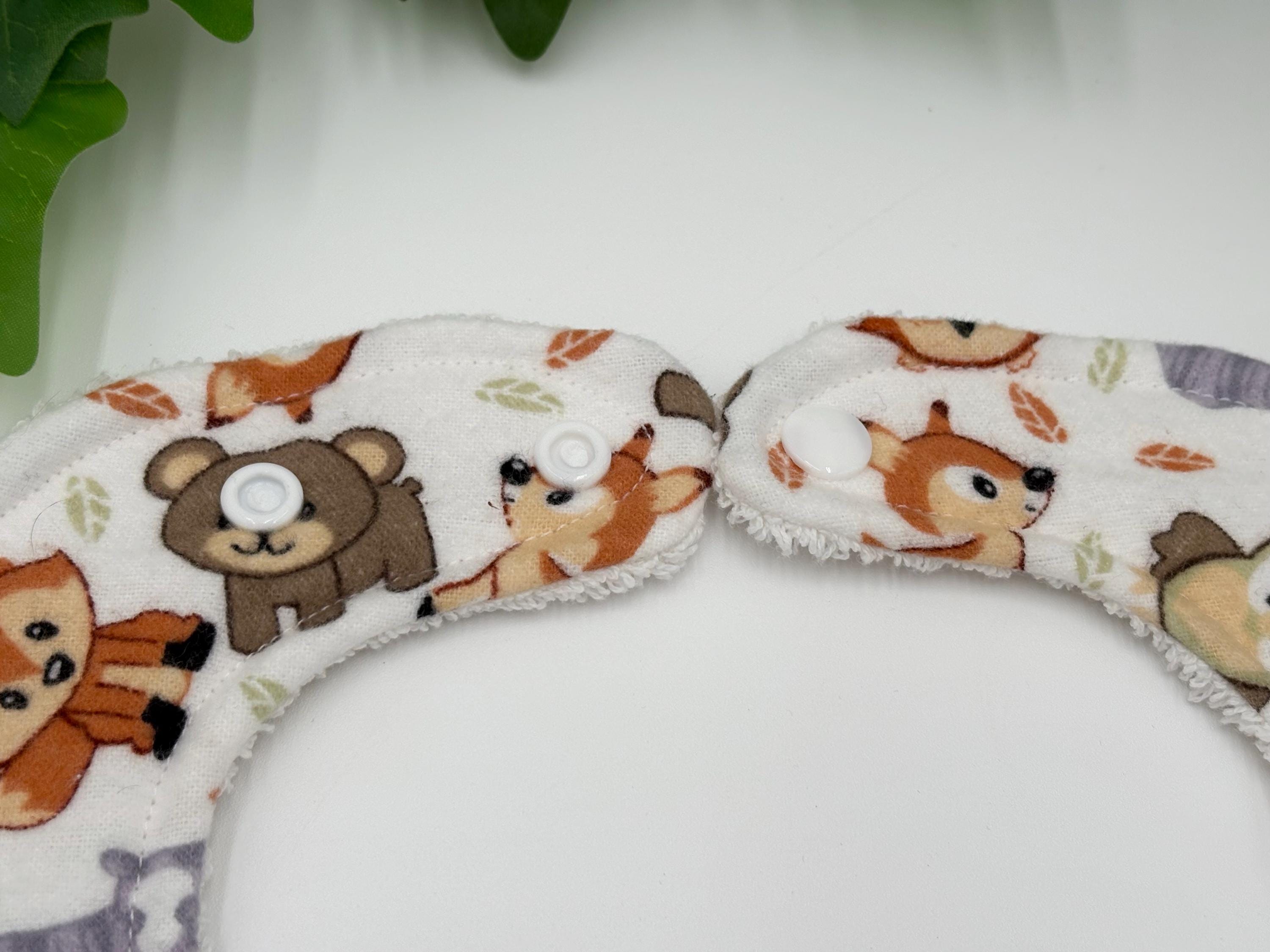 Fabric trim with animal designs on a white background
